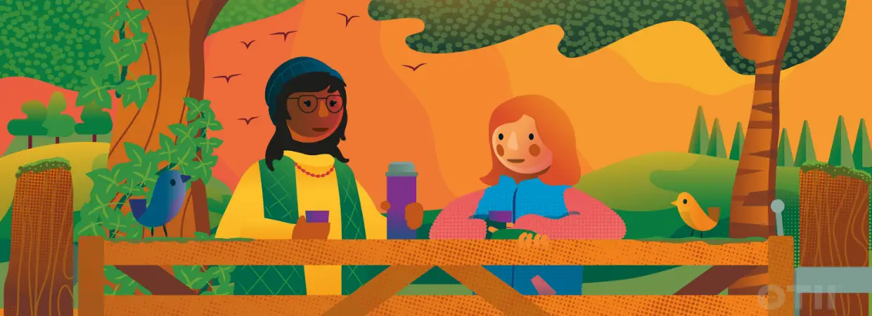 Two women smiling together, representing connection and support during menopause.